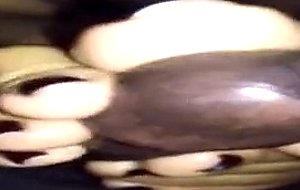 Naked footjob for this big black cock