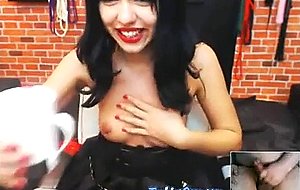 Brunette watching webcam at trylivecam