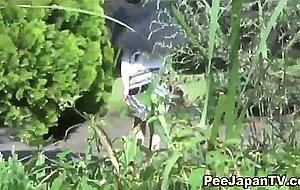 Asian teen parkbench pee