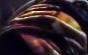 Covering her face with cum