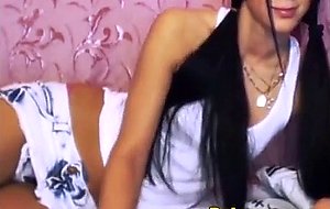 Hot looking brunette teen teasses her sweet body