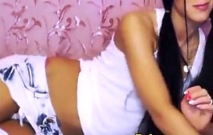 Hot looking brunette teen teasses her sweet body