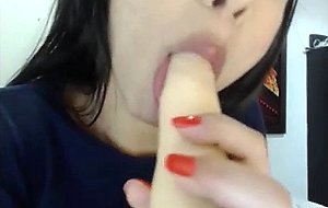 Slutty teen tranny sucking her new vibrator 