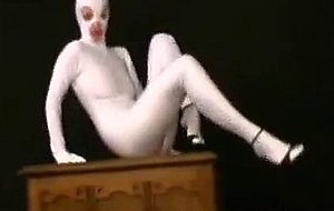 Strip in white fullbody spandex catsuit