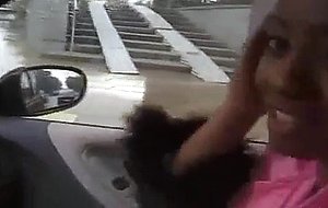 Cute German black girl in passenger seat