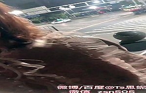 Chinese young girl walking on street part