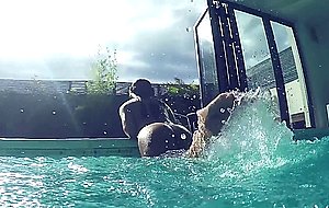 Holly gets nude in the pool
