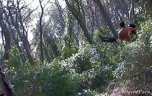 Wild man gets hold of babe on hike