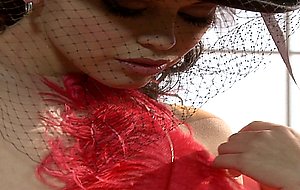 Evie delatosso masturbates in a sensual corset