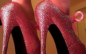 Erotic hypnotist trancing slaves with her crystal platform high heels and shiny pantyhose