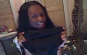 Ebony Tgirl shows her ass on webcam