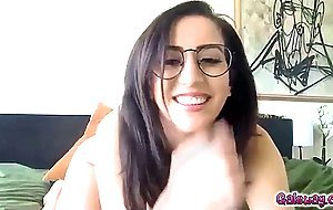 Natasha sensually strips down for a live show