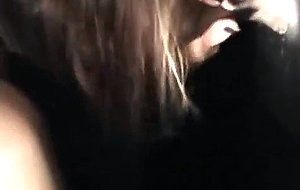 Amateur wife in red sucks big black cock at glory hole