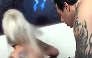Tattooed milf takes it in the ass
