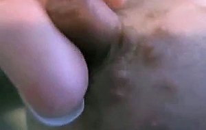 Twisting her intense nips