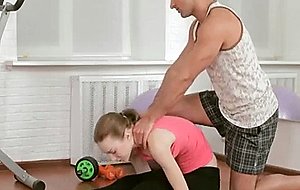 Adorable teen stretching with coach