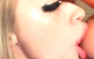 Webcam girl sucks a dildo