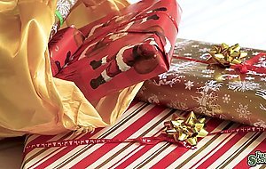 Madison is writing her letter to Santa telling wht she wants for Christmas