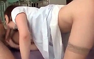 Jap teacher sucks and fucks two big shafts in 3some at school