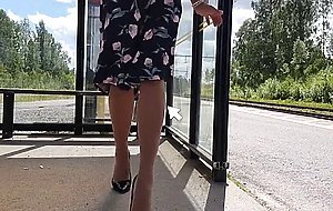 HannaTransa Chastity Crossdresser outdoors at train station.