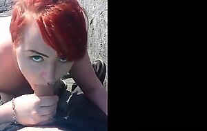 Red hair painted girl sucks dick outdoors and swallows