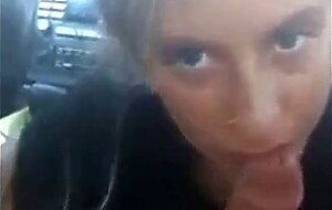 Pierced Brunette Blows in the Car