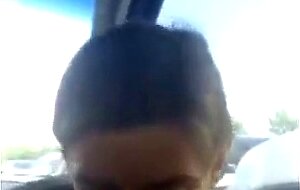 Pierced Brunette Blows in the Car