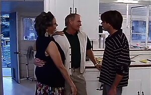 A milf who feels young and fucks with two cocks one of which is black