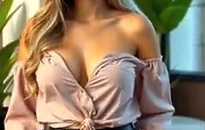 Cute blonde girl looks sexy and desirable by showing her breasts and provocative ass (18