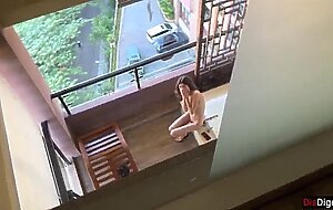 Horny neighbor masturbates on...
