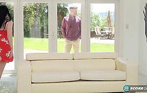 Busty teen Em Indica gets a sloppy creampie from an older guy.