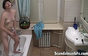 Solo teen masturbates in the shower