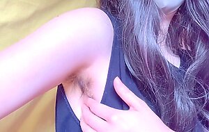 A Japanese amateur in a tank top just strokes her armpit hair [homemade]