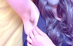 A Japanese amateur in a tank top just strokes her armpit hair [homemade]