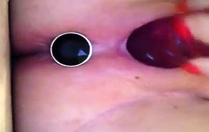 Plug in my asshile while fucking my pussy with a vibrator