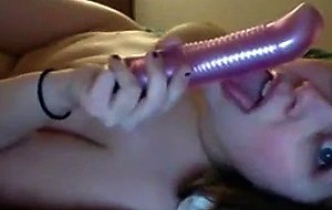 Sexy whore with firm breasts rubbing her pussy in bed