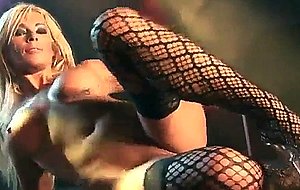 Busty milf stripping on public stage
