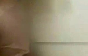 Crossdresser bathroom pose