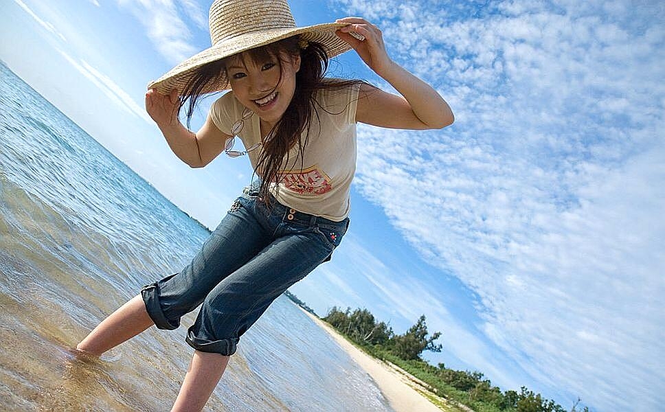 Beautiful Japanese girl Misako gets totally naked while at the beach